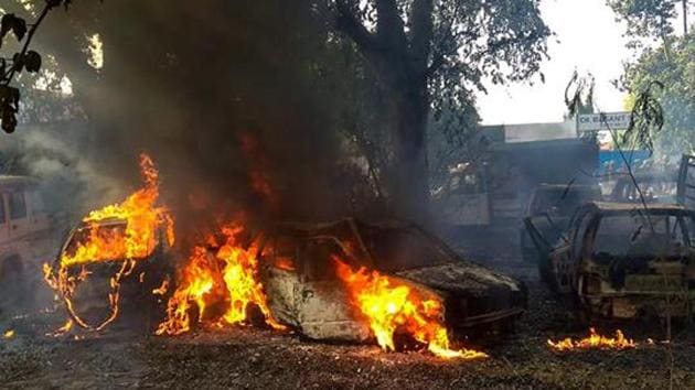 Vehicles set on fire by a mob during a protest over the alleged illegal slaughter of cattle, in Bulandshahr. According to Additional Director General of Meerut zone Prashant Kumar, protesters from Mahaw village and nearby areas pelted stones on the police and indulged in arson setting several vehicles and the Chingarwathi Police Chowki on fire. (PTI) Vehicles set on fire by a mob during a protest over the alleged illegal slaughter of cattle, in Bulandshahr. According to Additional Director General of Meerut zone Prashant Kumar, protesters from Mahaw village and nearby areas pelted stones on the police and indulged in arson setting several vehicles and the Chingarwathi Police Chowki on fire. (PTI)