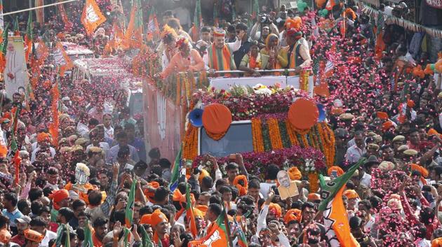 BJP National President Amit Shah showers flower petals during a road show for rajasthan assembly election in Ajmer(HT file photo) BJP National President Amit Shah showers flower petals during a road show for rajasthan assembly election in Ajmer(HT file photo)