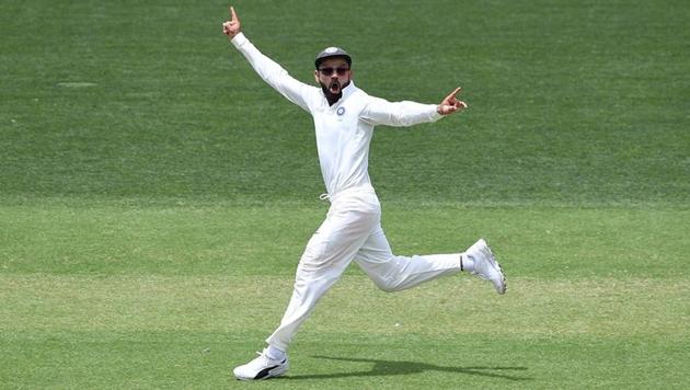India's captain Virat Kohli reacts to the dismissal of Australian batsman Usman Khawaja who was given out on review from the bowling of Ravichandran Ashwin on day two of the first test match between Australia and India at the Adelaide Oval in Adelaide, Australia, December 7, 2018. AAP/Dave Hunt/via REUTERS (REUTERS) India's captain Virat Kohli reacts to the dismissal of Australian batsman Usman Khawaja who was given out on review from the bowling of Ravichandran Ashwin on day two of the first test match between Australia and India at the Adelaide Oval in Adelaide, Australia, December 7, 2018. AAP/Dave Hunt/via REUTERS (REUTERS)