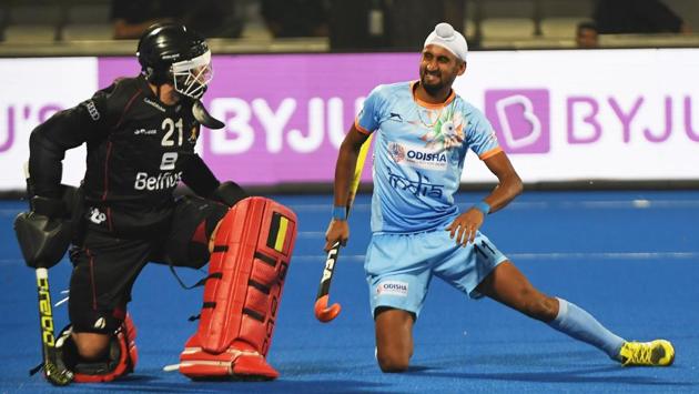 India’s Mandeep Singh reacts after missing a chance to score against Belgium during the field hockey group stage match between India and Belgium at the 2018 Hockey World in Bhubaneswar, Odisha. (Dibyangshu Sarkar / AFP) India’s Mandeep Singh reacts after missing a chance to score against Belgium during the field hockey group stage match between India and Belgium at the 2018 Hockey World in Bhubaneswar, Odisha. (Dibyangshu Sarkar / AFP)