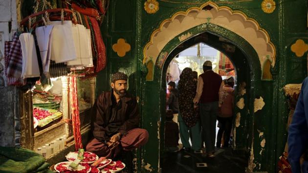 A plea has been moved in the Delhi High Court by female law students seeking directions to the Centre and other authorities to permit entry of women into the sanctum sanctorum of Hazrat Nizamuddin Aulia Dargah in New Delhi. The PIL has claimed that there is a notice put up outside the ‘dargah’ clearly stating in English and Hindi that women are not allowed inside. (Altaf Qadri / AP File) A plea has been moved in the Delhi High Court by female law students seeking directions to the Centre and other authorities to permit entry of women into the sanctum sanctorum of Hazrat Nizamuddin Aulia Dargah in New Delhi. The PIL has claimed that there is a notice put up outside the ‘dargah’ clearly stating in English and Hindi that women are not allowed inside. (Altaf Qadri / AP File)
