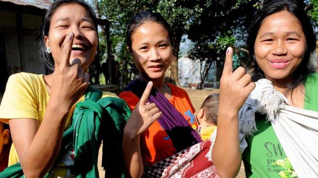 Young-girls-show-their-marked-fingers-after-casting-votes-for-Lok-Sabha-polls-at-a-polling-station-in-Aizawl-Mizoram(PTI)
