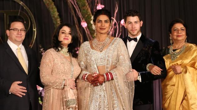 Denise Miller-Jonas (left) Priyanka Chopra, Nick Jonas and Madhu Chopra at the wedding reception in Delhi.(IANS)