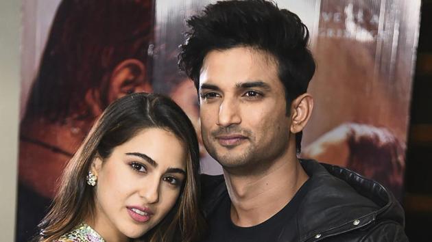Bollywood actors Sushant Singh Rajput and Sara Ali Khan pose for photos during promotions for the film Kedarnath.(PTI)