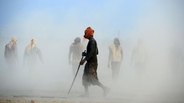 Labourers construct a temporary road on the banks of the Sangam for the upcoming Kumbh Mela festival, in Prayagraj. The Kumbh Mela will see millions of Hindu devotees gather from January 15 to March 4, 2019 to take a ritual bath in the holy waters, believed to cleanse sins and bestow blessings. (Sanjay Kanojia / AFP) Labourers construct a temporary road on the banks of the Sangam for the upcoming Kumbh Mela festival, in Prayagraj. The Kumbh Mela will see millions of Hindu devotees gather from January 15 to March 4, 2019 to take a ritual bath in the holy waters, believed to cleanse sins and bestow blessings. (Sanjay Kanojia / AFP)