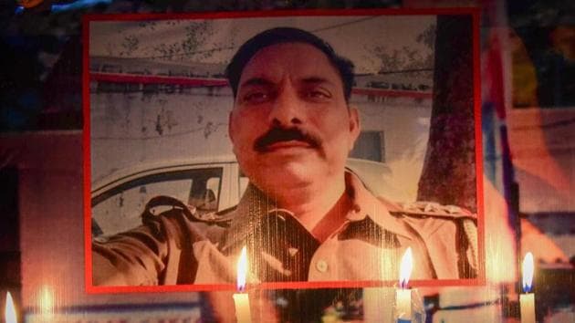 An initial probe into the Bulandshahr violence suggests that inspector Subodh Kumar Singh (in photo) and local youth Sumit Kumar were shot dead with same bore pistol or pistols.(PTI)