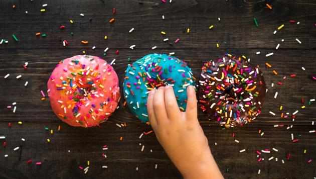 Israeli chefs are giving the traditionally basic Hanukkah doughnut -- called sufganiyot in Hebrew -- a higher purpose.(Photo by Patrick Fore on Unsplash) Israeli chefs are giving the traditionally basic Hanukkah doughnut -- called sufganiyot in Hebrew -- a higher purpose.(Photo by Patrick Fore on Unsplash)
