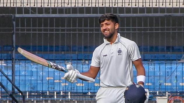 Madhya Pradesh's Ajay Rohera celebrates after making a world record for slamming the highest first-class score on debut, an unbeaten 267 against Hyderabad in their Ranji Trophy Elite Group B. (PTI)