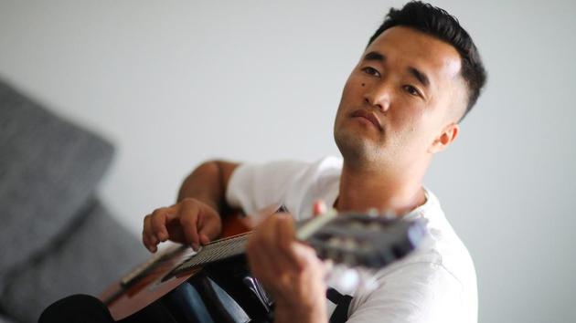 Rezaie plays guitar in his flat in Berlin. “It wasn’t a special day. I was tired and had been on the road for two months,” he told Reuters of his overland journey through the Balkans. Since then he’s sung in a choir and done internships and temporary work at a nursing home, a bakery, hotels and restaurants. It is a far cry from the village of his birth 26 years ago. (Hannibal Hanschke / REUTERS) Rezaie plays guitar in his flat in Berlin. “It wasn’t a special day. I was tired and had been on the road for two months,” he told Reuters of his overland journey through the Balkans. Since then he’s sung in a choir and done internships and temporary work at a nursing home, a bakery, hotels and restaurants. It is a far cry from the village of his birth 26 years ago. (Hannibal Hanschke / REUTERS)