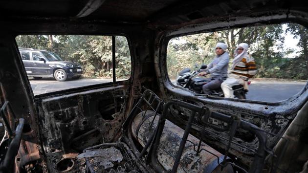 A charred vehicle is seen after it was burnt by a mob during a protest in Chingrawti village in Bulandshahr district, Uttar Pradesh. (Adnan Abidi / REUTERS) A charred vehicle is seen after it was burnt by a mob during a protest in Chingrawti village in Bulandshahr district, Uttar Pradesh. (Adnan Abidi / REUTERS)