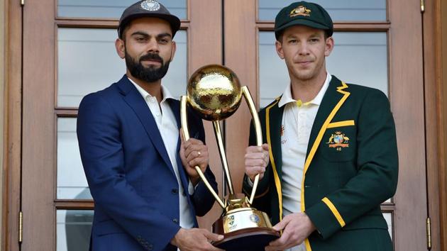 Australia cricket captain Tim Paine (R) and India cricket captain Virat Kohli (L) pose with the Border Gavaskar trophy. (AFP) Australia cricket captain Tim Paine (R) and India cricket captain Virat Kohli (L) pose with the Border Gavaskar trophy. (AFP)