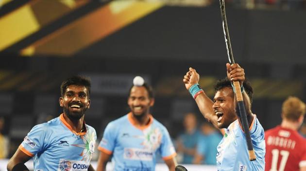 India's Amit Rohidas (R) celebrate after scoring a goal against Canada during the field hockey group stage match between India and Canada at the 2018 Hockey World Cup in Bhubaneswar on December 8, 2018. (AFP) India's Amit Rohidas (R) celebrate after scoring a goal against Canada during the field hockey group stage match between India and Canada at the 2018 Hockey World Cup in Bhubaneswar on December 8, 2018. (AFP)