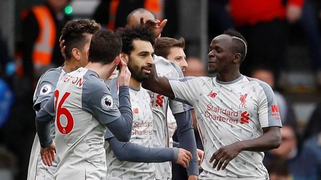 Liverpool's Mohamed Salah celebrates scoring their fourth goal with Sadio Mane and team mates.(REUTERS) Liverpool's Mohamed Salah celebrates scoring their fourth goal with Sadio Mane and team mates.(REUTERS)