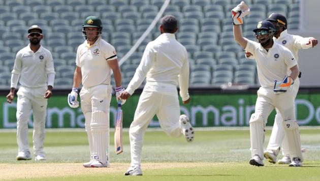 Indian players celebrate the dismissal of Australia's Aaron Finch, second left.(AP)