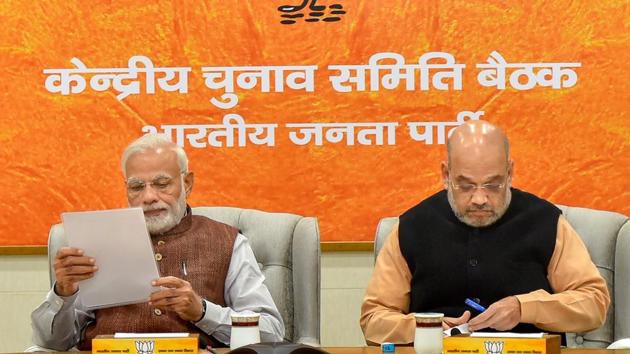 Prime Minister Narendra Modi and BJP president Amit Shah during the party's Central Election Committee meeting for the forthcoming Assembly polls in Rajasthan, at party headquarters in New Delhi on Sunday. (PTI) Prime Minister Narendra Modi and BJP president Amit Shah during the party's Central Election Committee meeting for the forthcoming Assembly polls in Rajasthan, at party headquarters in New Delhi on Sunday. (PTI)