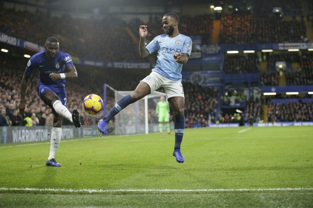 Chelsea's Antonio Rudiger, left, and Manchester City's Raheem Sterling compete for the ball during a Premier League match. (AP) Chelsea's Antonio Rudiger, left, and Manchester City's Raheem Sterling compete for the ball during a Premier League match. (AP)