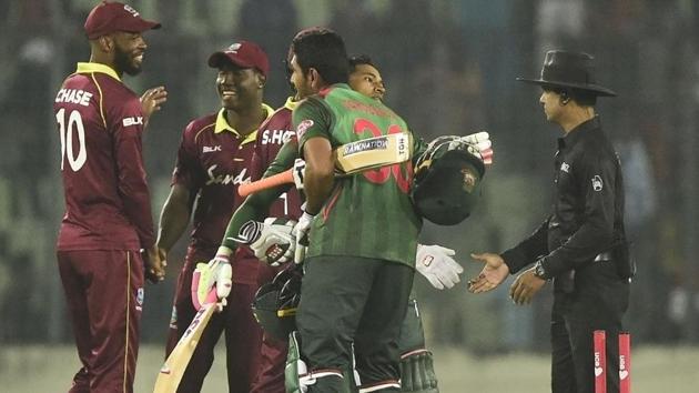 Bangladesh cricketer Mushfiqur Rahim (2R) hugs his teammate Mohammad Mahmudullah (3R) after winning the first One Day International (ODI) between Bangladesh and West Indies at the Sher-e-Bangla National Cricket Stadium. (AFP) Bangladesh cricketer Mushfiqur Rahim (2R) hugs his teammate Mohammad Mahmudullah (3R) after winning the first One Day International (ODI) between Bangladesh and West Indies at the Sher-e-Bangla National Cricket Stadium. (AFP)
