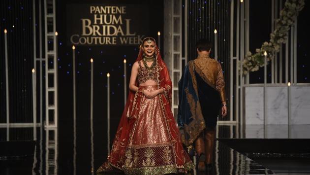 A model presents a creation by designer Nilofer Shahid during the Pantene Hum Bridal Couture Week in Lahore. (AFP) A model presents a creation by designer Nilofer Shahid during the Pantene Hum Bridal Couture Week in Lahore. (AFP)