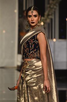 A model presents a creation by designer Nilofer Shahid during the Pantene Hum Bridal Couture Week in Lahore. (AFP) A model presents a creation by designer Nilofer Shahid during the Pantene Hum Bridal Couture Week in Lahore. (AFP)