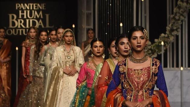 Models present creations by designer Nilofer Shahid during the Pantene Hum Bridal Couture Week in Lahore on December 7, 2018. (AFP) Models present creations by designer Nilofer Shahid during the Pantene Hum Bridal Couture Week in Lahore on December 7, 2018. (AFP)
