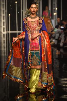 A model presents a creation by designer Nilofer Shahid during the Pantene Hum Bridal Couture Week in Lahore. (AFP) A model presents a creation by designer Nilofer Shahid during the Pantene Hum Bridal Couture Week in Lahore. (AFP)