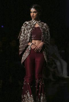 A model presents a creation by designer Reema Hasan during Bridal Couture Week, in Lahore, Pakistan. (AP) A model presents a creation by designer Reema Hasan during Bridal Couture Week, in Lahore, Pakistan. (AP)