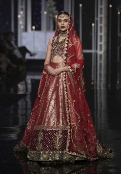 A model presents a creation by designer Nilofer Couture during Bridal Couture Week, in Lahore, Pakistan. (AP) A model presents a creation by designer Nilofer Couture during Bridal Couture Week, in Lahore, Pakistan. (AP)