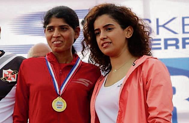 Swati Gadave (L) with Sanya Malhotra, actor and chief guest, at the Skechers Goa river half marathon in Goa on Sunday. (HT PHOTO) Swati Gadave (L) with Sanya Malhotra, actor and chief guest, at the Skechers Goa river half marathon in Goa on Sunday. (HT PHOTO)