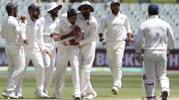 India's Jasprit Bumrah is congratulated by teammates after dismissing Australia's Shaun Marsh. (AP)