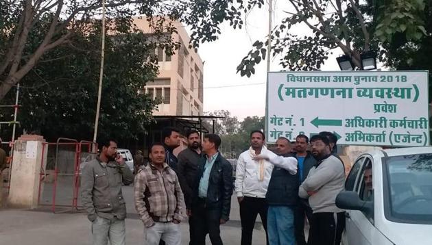 Rajasthan assembly election 2018: Congress workers outside a strong room in Udaipur, Sunday, December 9, 2018.(HT Photo) Rajasthan assembly election 2018: Congress workers outside a strong room in Udaipur, Sunday, December 9, 2018.(HT Photo)