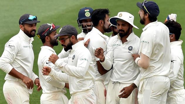 India's captain Virat Kohli (2nd L) celebrates his team's victory against Australia. (AFP)