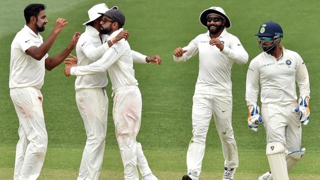 India's captain Virat Kohli (C) cleberates India's victory against Australia in the first Test. (AFP)