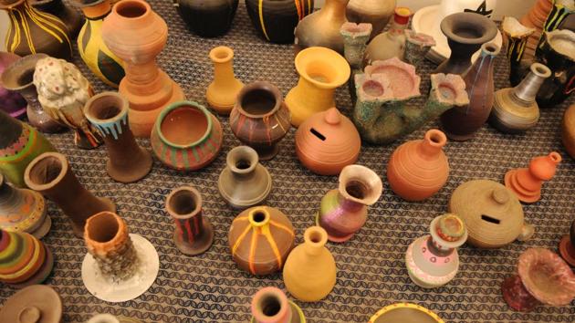 Tiny pots and vases, a result of work done by inmates. The jail’s 2,395 male inmates and 55 female inmates have taken to the classes as a means of artistic expression. Also quite popular are the quilling classes and the funky jewellery pieces that come from them. (Parveen Kumar / HT Photo)
