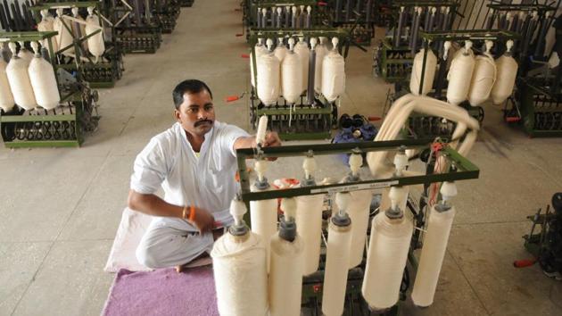 The yarn spinning class is among the most popular ones among inmates. The Khadi Gramodyog, which started the classes in 2016, taught a few inmates who mastered the skill and now impart it to others who volunteer to learn. (Parveen Kumar / HT Photo)