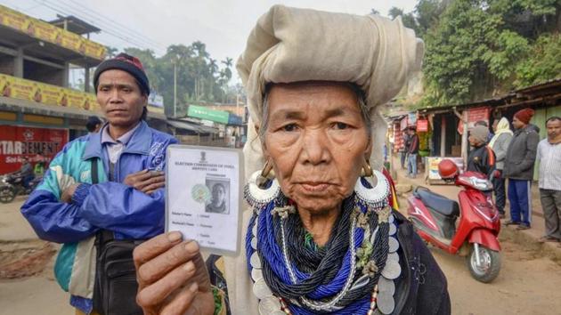 Mizoram elections 2018: A Bru tribal woman shows her identity card. Counting of votes for Mizoram and four other states will take place on Tuesday.(PTI file photo)