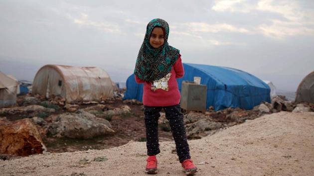 “To begin with there were difficulties getting used to them,” her uncle Hussein, who accompanied his brother and niece to Turkey said. “All of a sudden she found herself up high on the new prosthetics.” (Aaref Watad / AFP) “To begin with there were difficulties getting used to them,” her uncle Hussein, who accompanied his brother and niece to Turkey said. “All of a sudden she found herself up high on the new prosthetics.” (Aaref Watad / AFP)