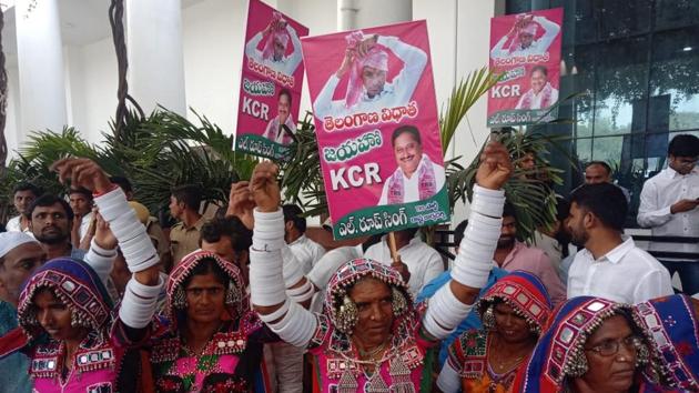 TRS supporters celebrating outside the party office,Telangana Bhavan, in Hyderabad. The Telangana Rashtra Samithi (TRS) appears set to retain power and form the next government in Telangana taking 88 seats out of 119. The Congress-led opposition alliance, the nearest competitor managed a distant 21 seats. (Kunal Patil / HT Photo) TRS supporters celebrating outside the party office,Telangana Bhavan, in Hyderabad. The Telangana Rashtra Samithi (TRS) appears set to retain power and form the next government in Telangana taking 88 seats out of 119. The Congress-led opposition alliance, the nearest competitor managed a distant 21 seats. (Kunal Patil / HT Photo)