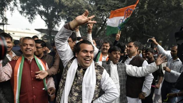 Congress party workers celebrate around noon after the party showed early leads in three states out of five in assembly election results at AICC, New Delhi. (Sanchit Khanna / HT Photo) Congress party workers celebrate around noon after the party showed early leads in three states out of five in assembly election results at AICC, New Delhi. (Sanchit Khanna / HT Photo)