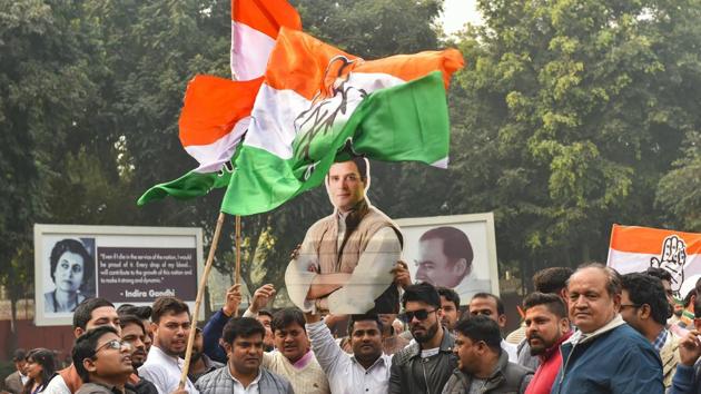 Congress workers celebrate the party's good show in assembly elections of Rajasthan, Chhattisgarh and Madhya Pradesh at AICC headquarters in New Delhi on Tuesday.(PTI)
