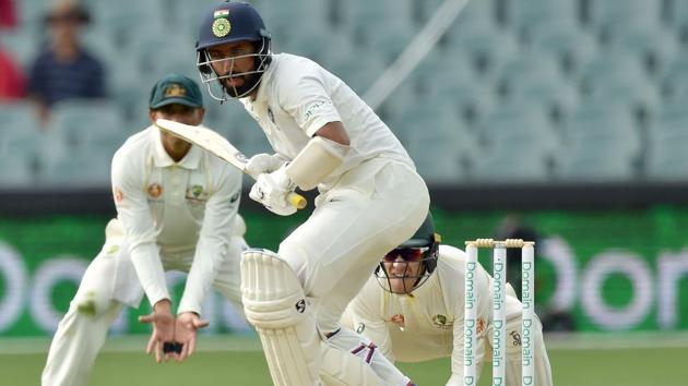India's batsman Cheteshwar Pujara (C) bats against Australia during day three of the first Test cricket match at the Adelaide Oval on December 8, 2018. (AFP) India's batsman Cheteshwar Pujara (C) bats against Australia during day three of the first Test cricket match at the Adelaide Oval on December 8, 2018. (AFP)