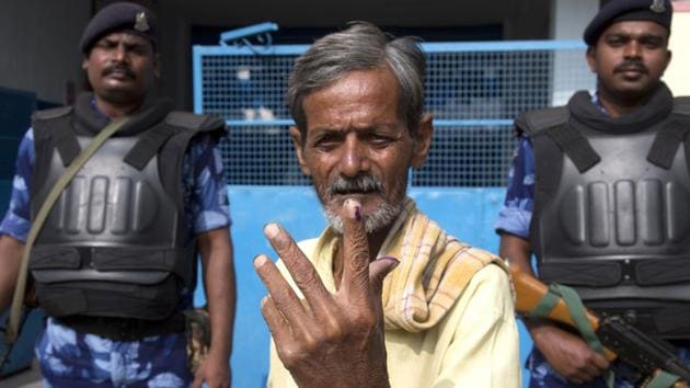 A man displays the indelible ink mark on his index fingers after casting his vote in Hyderabad, India, Friday, Dec. 7, 2018. This is the first state elections in Telangana after it was formed bifurcating Indian state of Andhra Pradesh.(AP) A man displays the indelible ink mark on his index fingers after casting his vote in Hyderabad, India, Friday, Dec. 7, 2018. This is the first state elections in Telangana after it was formed bifurcating Indian state of Andhra Pradesh.(AP)