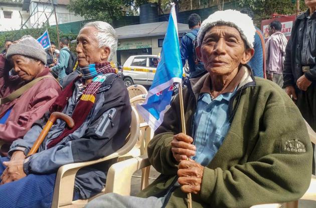 Mizo National Front (MNF) worker holds their party flag as they celebrate the party's victory in the states Assembly elections, at Party head office, in Aizawl. The MNF is set to return to power, having won 26 seats. The party returns in Mizoram after a gap of 10 years beating ruling Congress comprehensively in its last bastion in the northeast in the assembly elections. (PTI) Mizo National Front (MNF) worker holds their party flag as they celebrate the party's victory in the states Assembly elections, at Party head office, in Aizawl. The MNF is set to return to power, having won 26 seats. The party returns in Mizoram after a gap of 10 years beating ruling Congress comprehensively in its last bastion in the northeast in the assembly elections. (PTI)