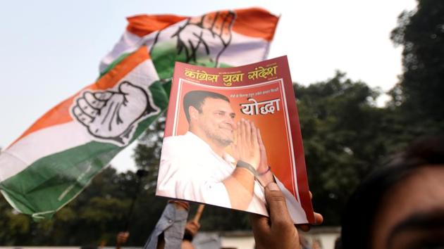 Congress supporters celebrate as the party gets lead in assembly elections at AICC in New Delhi on Tuesday. (Amal KS/HT PHOTO) Congress supporters celebrate as the party gets lead in assembly elections at AICC in New Delhi on Tuesday. (Amal KS/HT PHOTO)