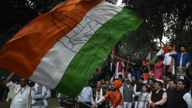 Congress supporters celebrate their party's victory at AICC in New Delhi on Decmber 11. (Biplov Bhuyan/HT PHOTO) Congress supporters celebrate their party's victory at AICC in New Delhi on Decmber 11. (Biplov Bhuyan/HT PHOTO)