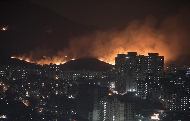 On December 3, a fire broke out at 6.21pm behind New Mhada Colony at Goregaon (East) and took almost 14 hours to be completely doused.(Satyabrata Tripathy/HT Photo) On December 3, a fire broke out at 6.21pm behind New Mhada Colony at Goregaon (East) and took almost 14 hours to be completely doused.(Satyabrata Tripathy/HT Photo)