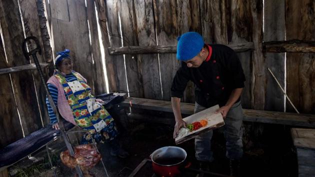 The nut can be used to make flour and drinks. It can be eaten raw or cooked. Some even use it to make jam, as well as savoury or sweet pies. “The pine nut contains lots of protein and calories. It has no salt or gluten, which makes it more healthy,” said Rene. (Martin Bernetti / AFP) 