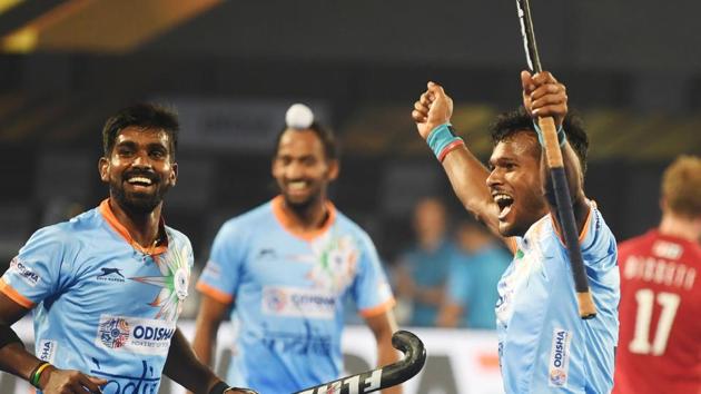 India's Amit Rohidas (R) celebrate after scoring a goal against Canada during the field hockey group stage match between India and Canada at the 2018 Hockey World Cup in Bhubaneswar on December 8, 2018. (AFP) India's Amit Rohidas (R) celebrate after scoring a goal against Canada during the field hockey group stage match between India and Canada at the 2018 Hockey World Cup in Bhubaneswar on December 8, 2018. (AFP)