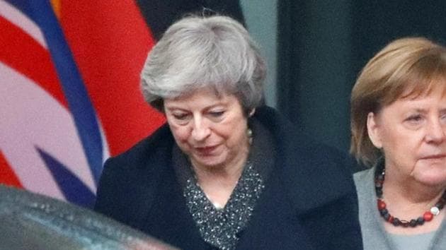 British Prime Minister Theresa May, who is boxed in on her options for Brexit, had her room for manoeuvre further diminished when she was briefly locked in her car in front of German leader Angela Merkel on Tuesday.(Reuters Photo) British Prime Minister Theresa May, who is boxed in on her options for Brexit, had her room for manoeuvre further diminished when she was briefly locked in her car in front of German leader Angela Merkel on Tuesday.(Reuters Photo)