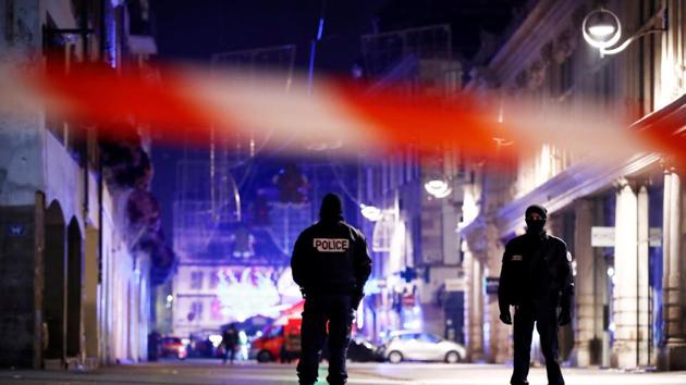 Police secure area where a suspect is sought after a shooting in Strasbourg, France, December 12, 2018 (REUTERS) (REUTERS) Police secure area where a suspect is sought after a shooting in Strasbourg, France, December 12, 2018 (REUTERS) (REUTERS)