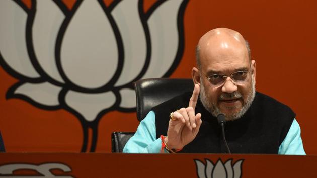 Party president Amit Shah will go into a huddle with senior leaders on Thursday to discuss the reasons behind the defeats the party faced in Madhya Pradesh, Chhattisgarh annd Rajasthan, and to lift the morale ahead of the 2019 general elections, according to senior leaders familiar with the matter.(HT PHOTO)